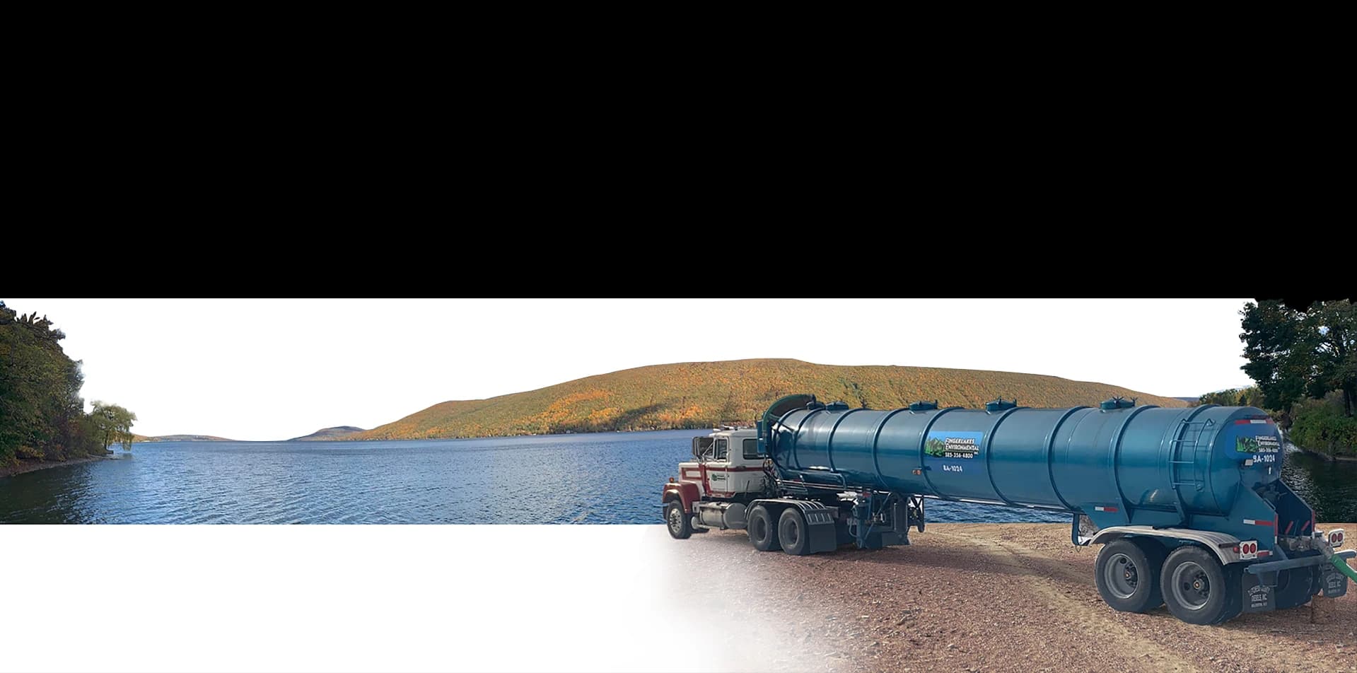 image of truck in front of lake